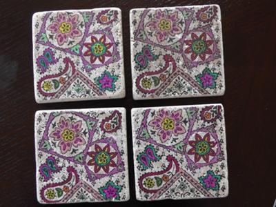 Fun and whimsical tumbled stone coasters